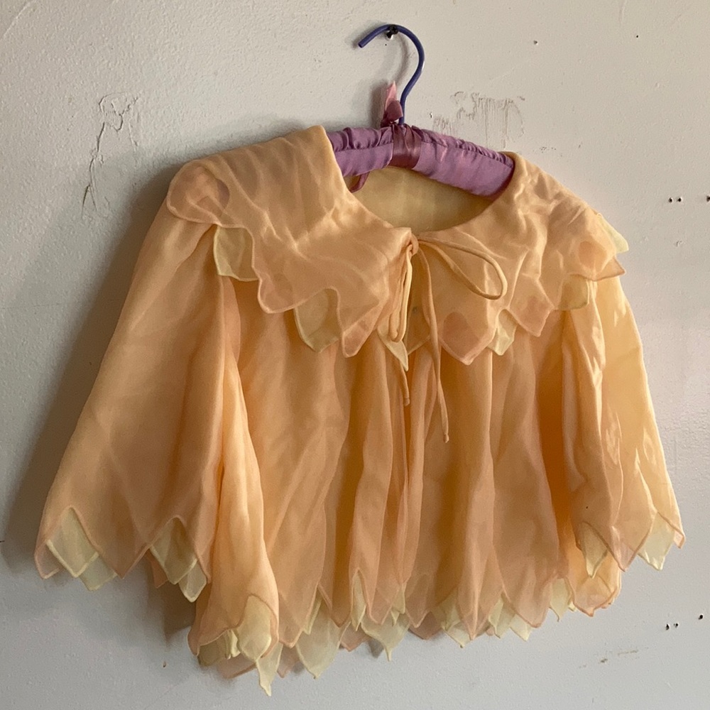 Sheer fairy shoulder shrug